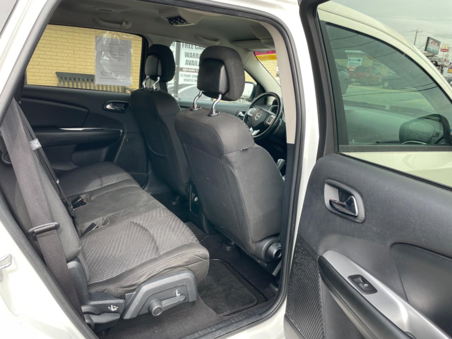 2016 White Dodge Journey (3C4PDCGB8GT) with an 4-Cyl, 2.4 Liter engine, Auto, 6-Spd AutoStick transmission, located at 8008 Warden Rd, Sherwood, AR, 72120, (501) 801-6100, 34.830078, -92.186684 - Photo#9